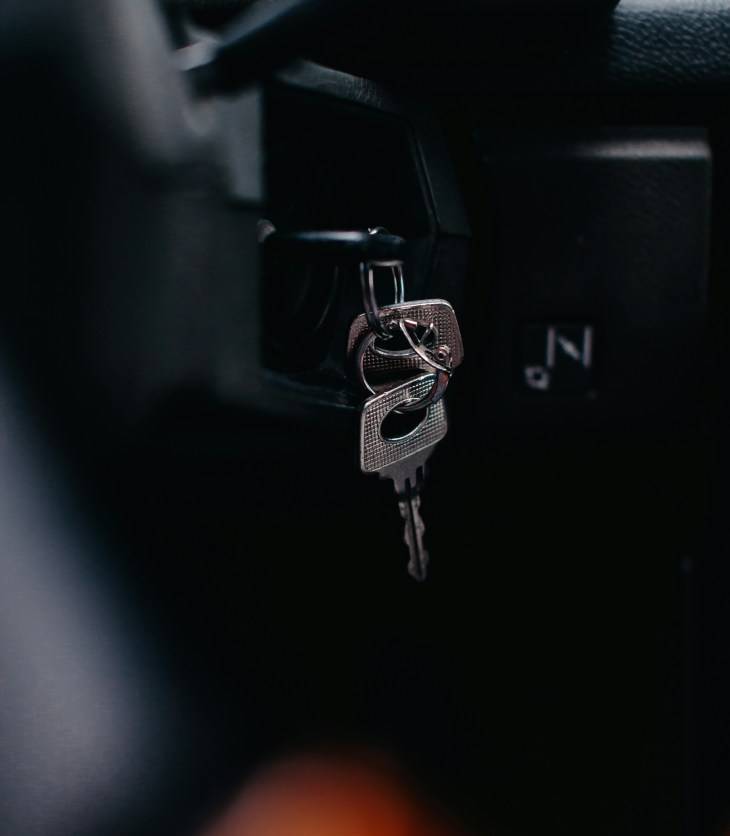 car keys in the ignition of a car